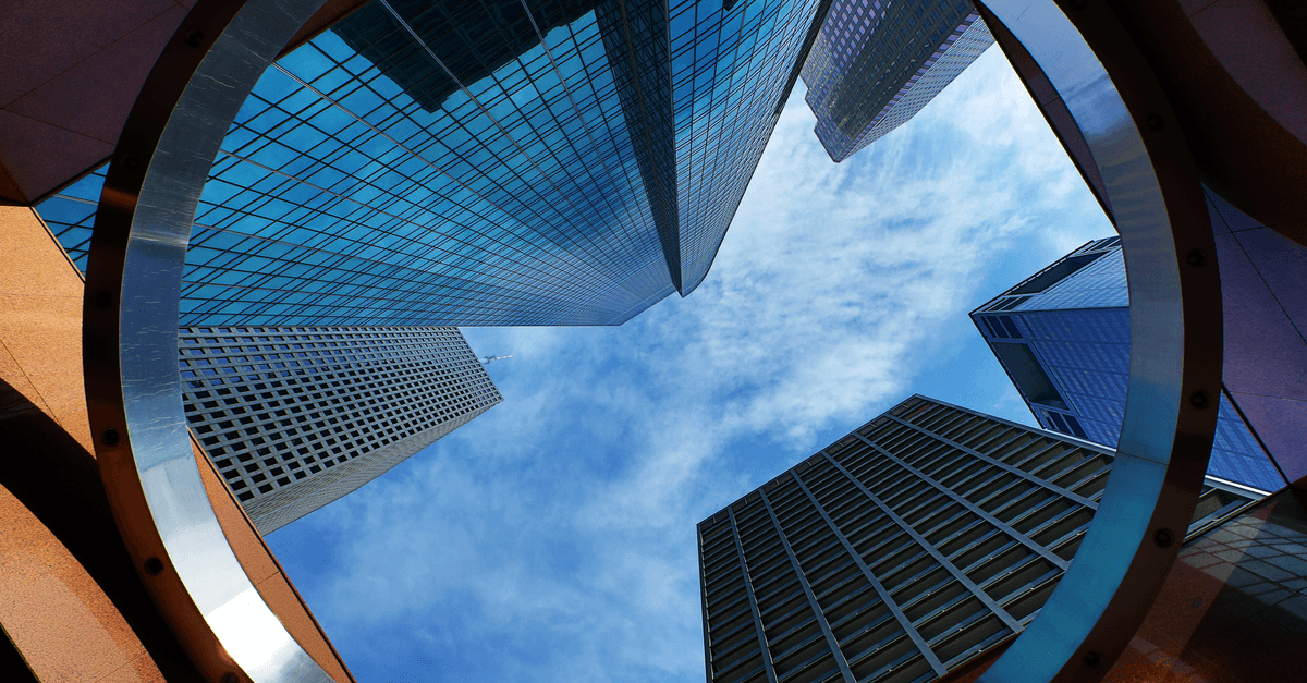 Vision of the sky through modern office buildings