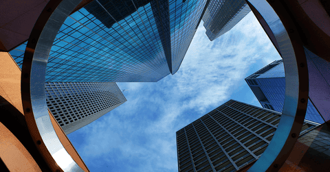Vision of the sky through modern office buildings