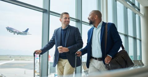 Two businessmen in airport