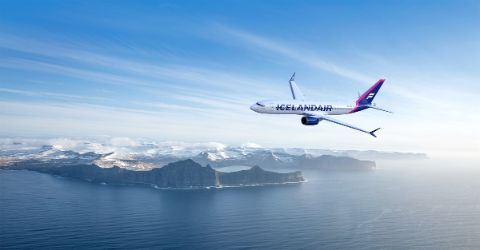 Icelandair branded aircraft above skies