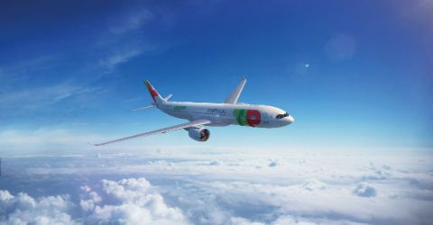 Aircraft in TAP livery flying above the skies