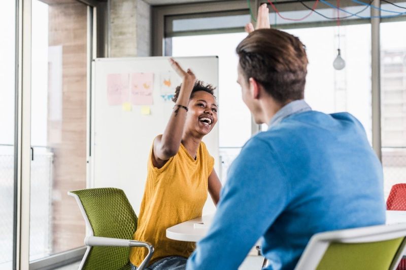high-five-celebrate-at-work