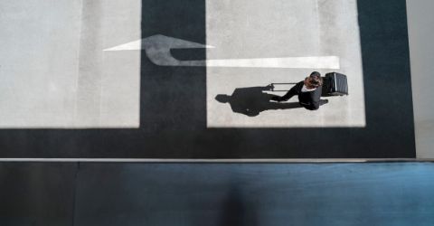 Business man walking to a plane