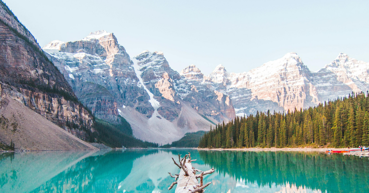 A Canadian landscape featuring a lake with mountains in the background